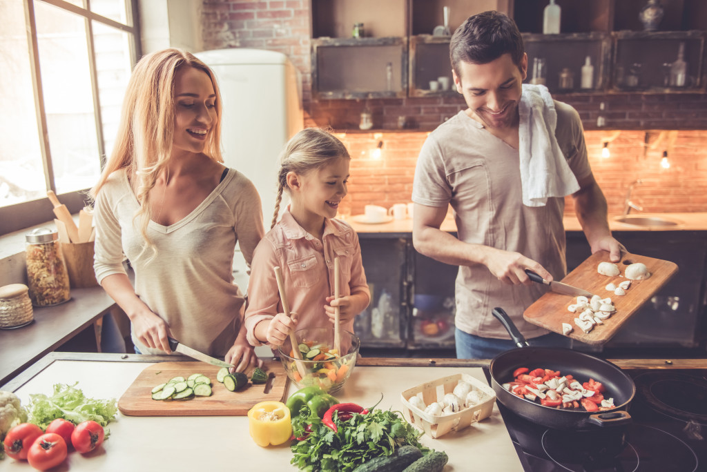 A family cooking in the kitchen